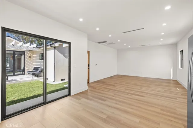 an aerial view of a house with a garden and plants