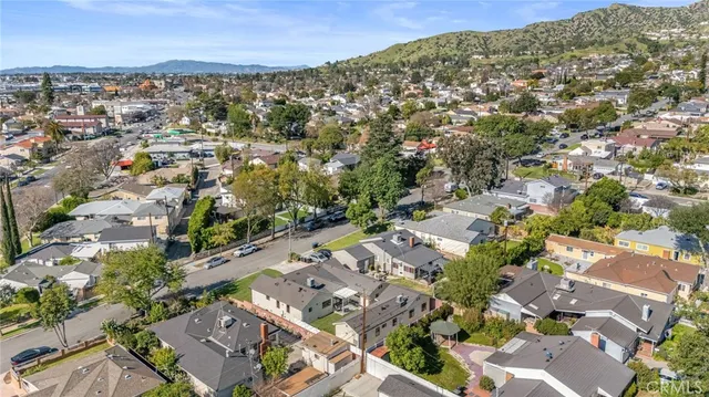 an aerial view of a city with lots of residential buildings