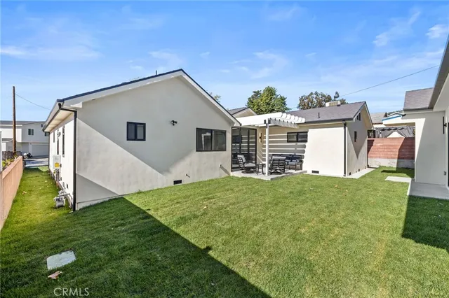 a house view with a garden space