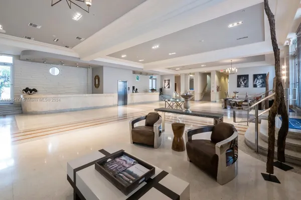 a couple of chairs sitting in front of a building