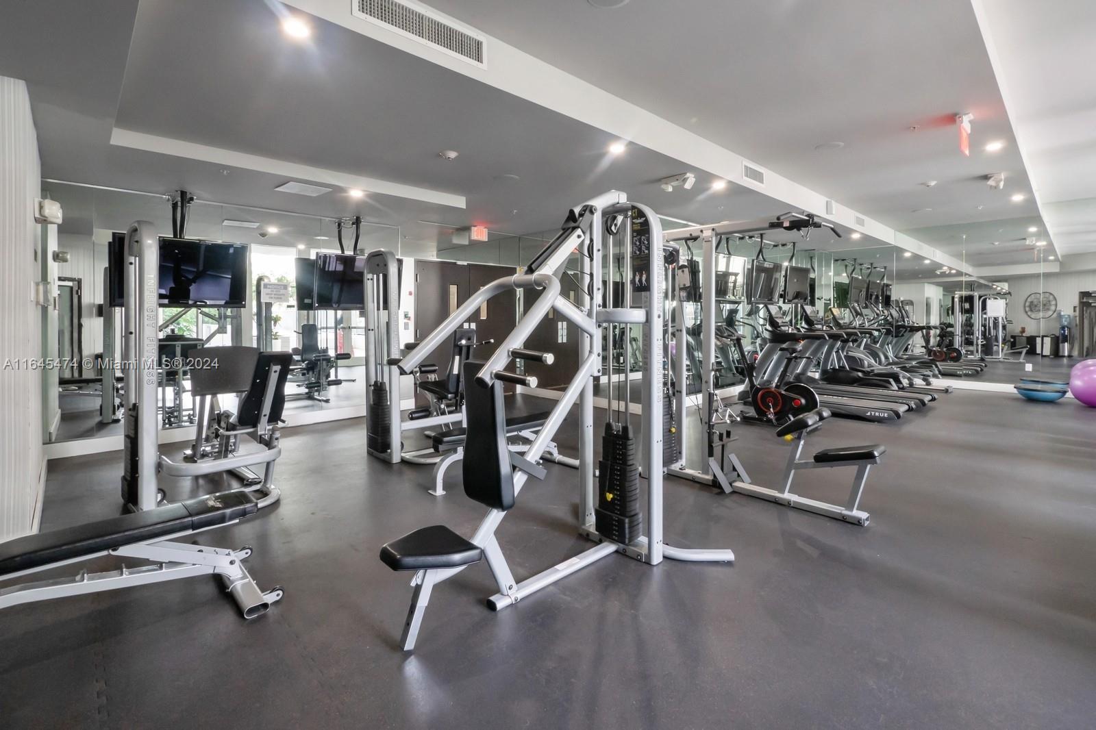 435 21st Street, Unit 310 Miami Beach, FL 33139 - Photo 23 of 28 a view of a room with gym equipment