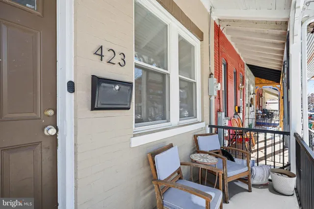 a building outdoor space with patio furniture