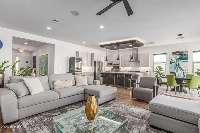 a kitchen with stove a sink and cabinets