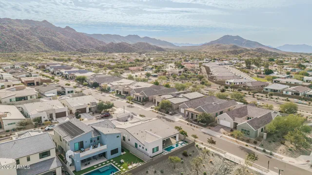 a view of a large body of water with a mountain in the background