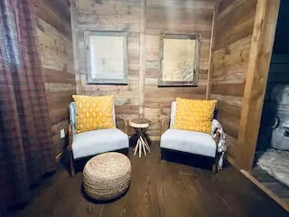 a bathroom with a sink mirror toilet and bathtub