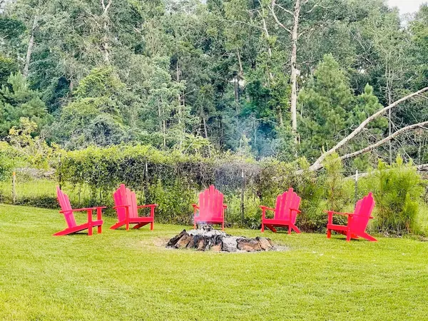 a view of a balcony with wooden floor