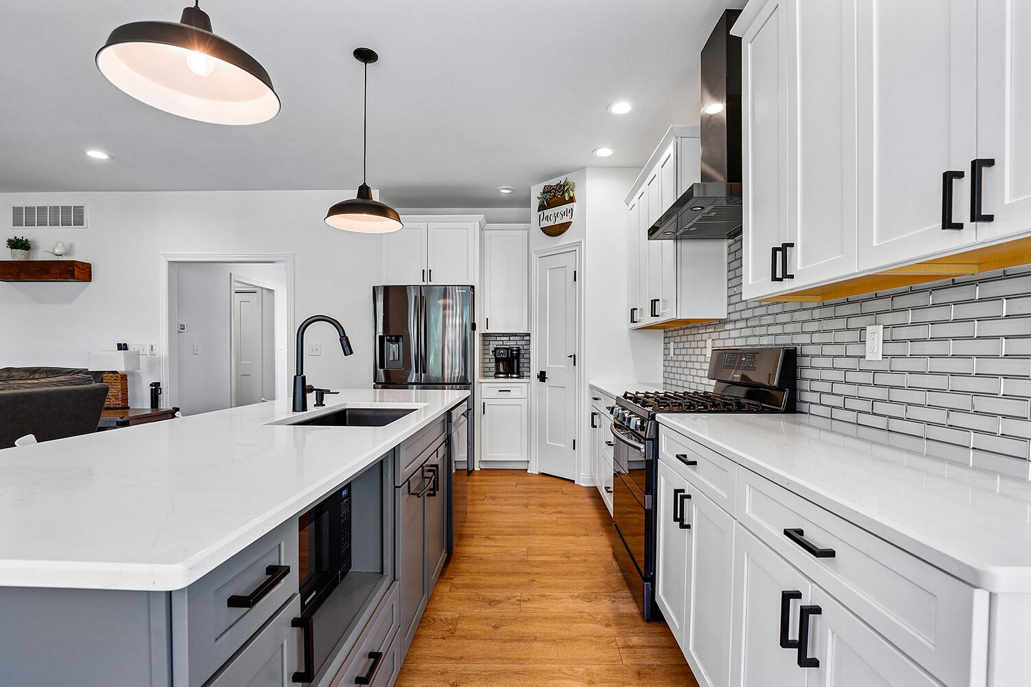 17152 High Point Court Lowell, IN 46356 - Photo 14 of 54 a kitchen with stainless steel appliances a sink a stove a refrigerator and cabinets