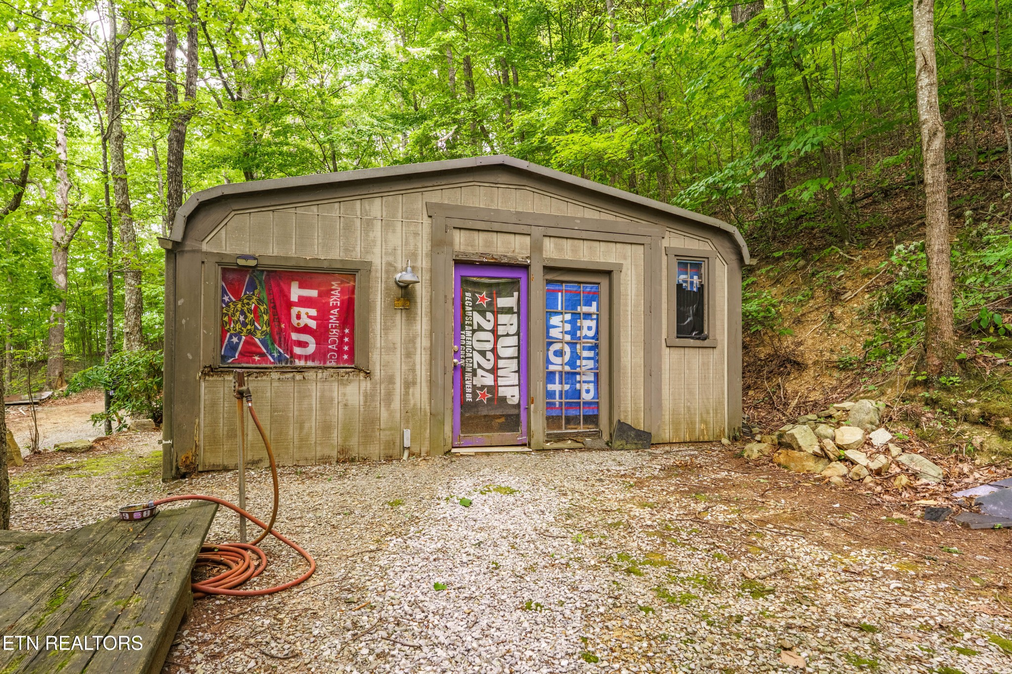 2939 Dupont Springs Road Sevierville, TN 37862 - Photo 14 of 20 a house with trees in the background