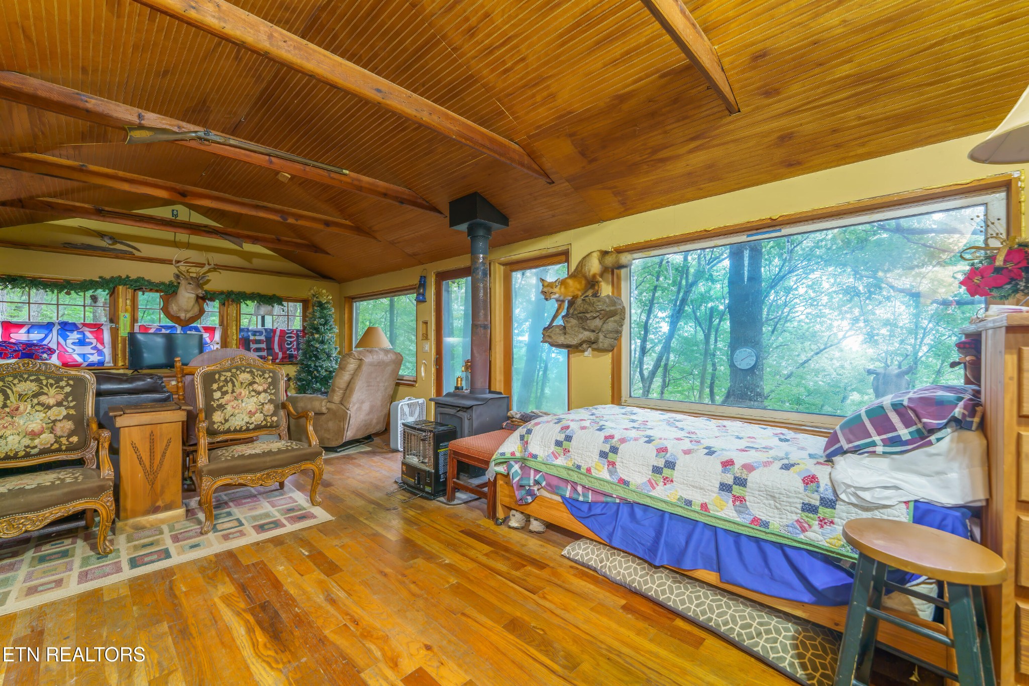 2939 Dupont Springs Road Sevierville, TN 37862 - Photo 6 of 20 a bedroom with furniture and a large window