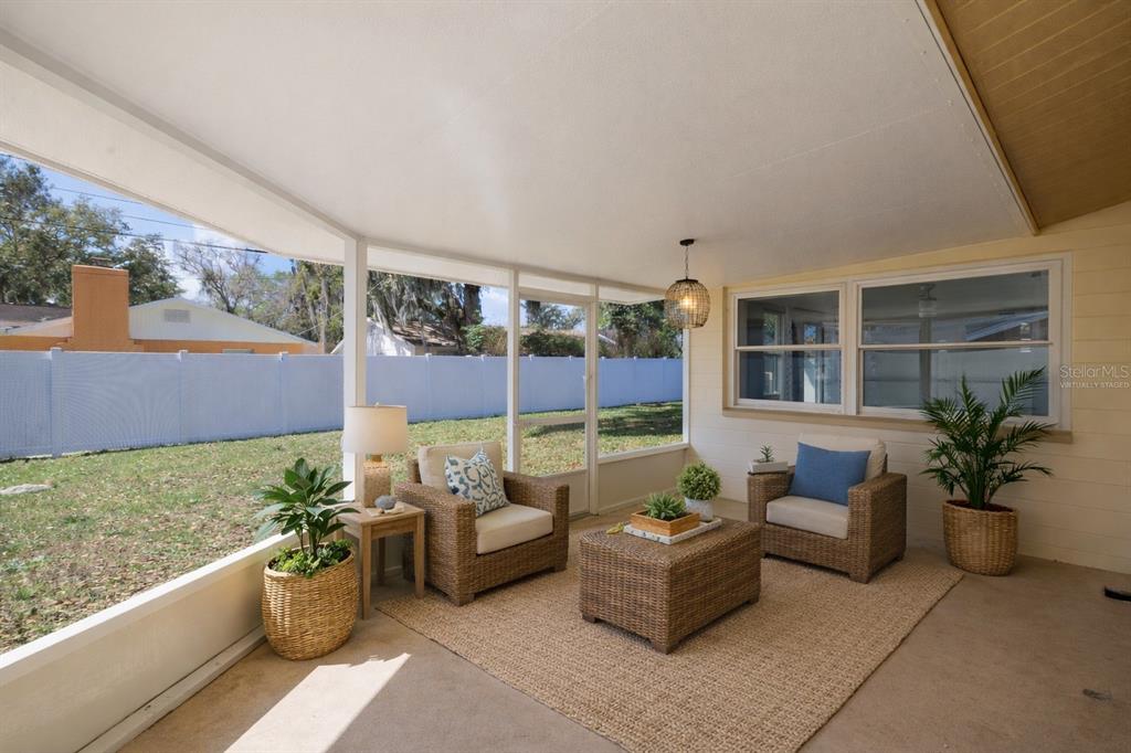 1016 Cherokee Ranch Road Holly Hill, FL 32117 - Photo 20 of 23 a building outdoor space with patio furniture