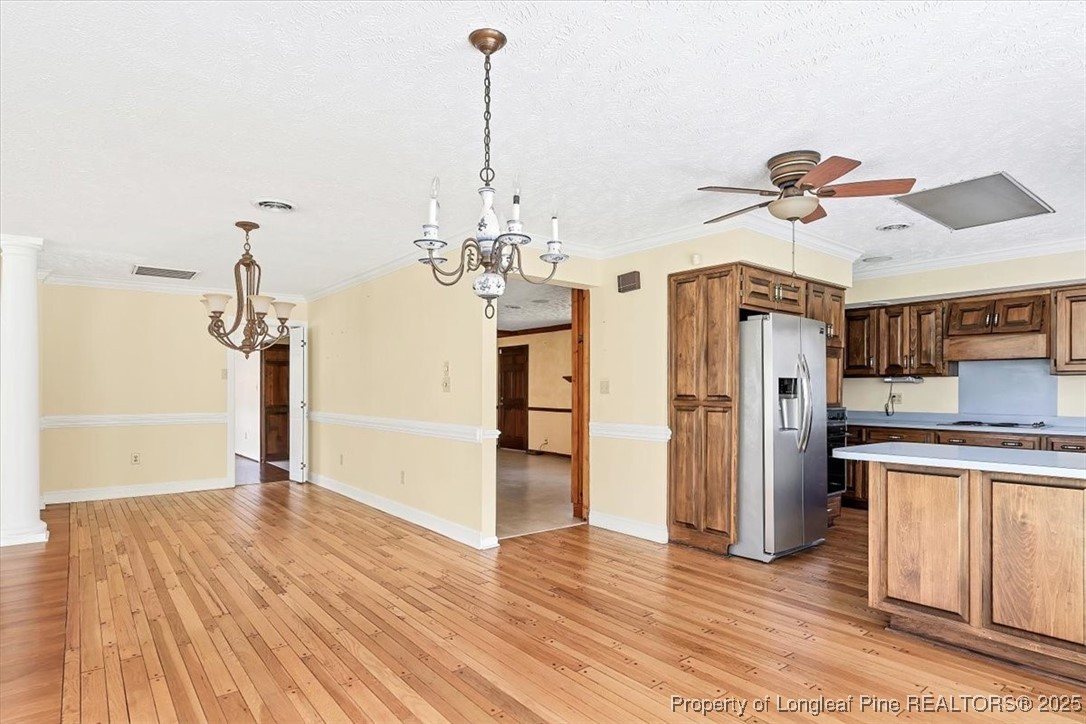 363 Bee Gee Road Lumberton, NC 28358 - Photo 16 of 45 a view of a kitchen with a sink and refrigerator
