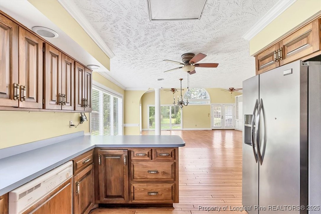363 Bee Gee Road Lumberton, NC 28358 - Photo 24 of 45 a kitchen with stainless steel appliances granite countertop a refrigerator a sink and a stove