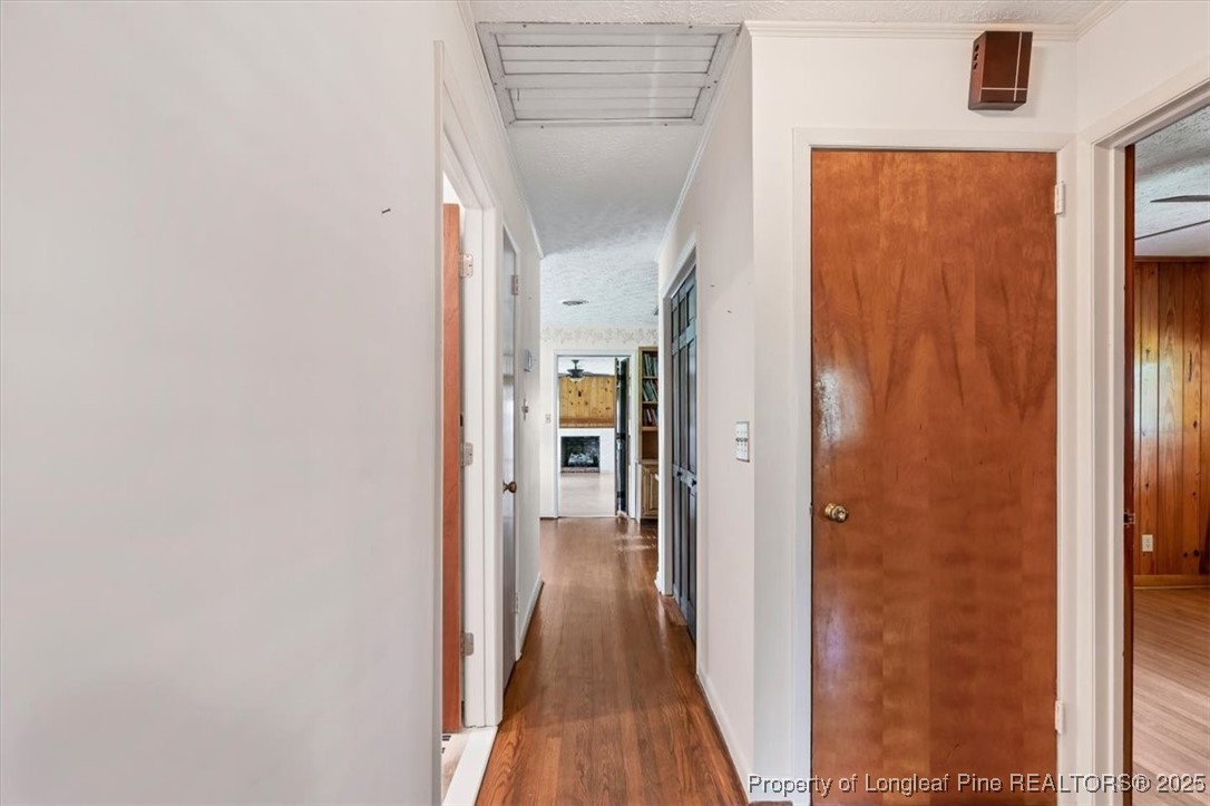 363 Bee Gee Road Lumberton, NC 28358 - Photo 26 of 45 a view of a hallway with wooden floor and closet