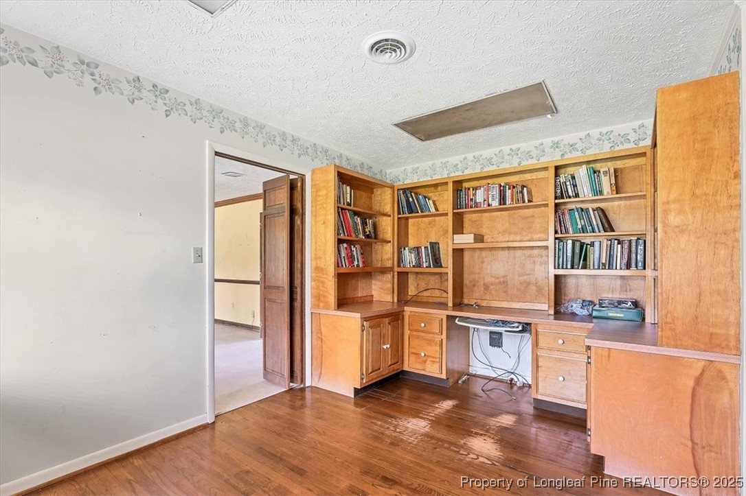 363 Bee Gee Road Lumberton, NC 28358 - Photo 28 of 45 a view of kitchen with furniture and wooden floor