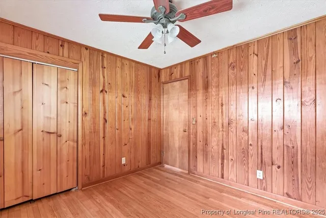 a view of a interior area with wooden wall