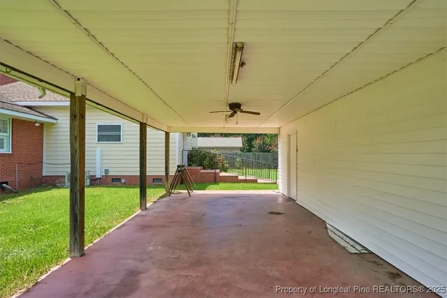 a view of a patio with a backyard