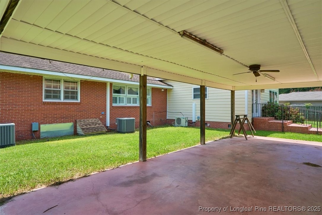 363 Bee Gee Road Lumberton, NC 28358 - Photo 43 of 45 a view of a house with a backyard and a garden