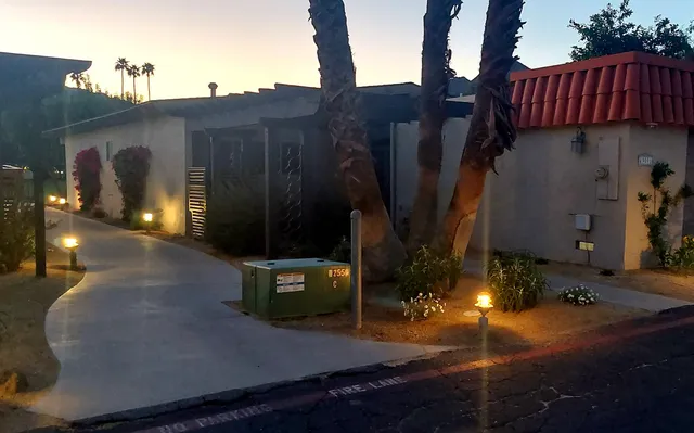 a view of a house with a street