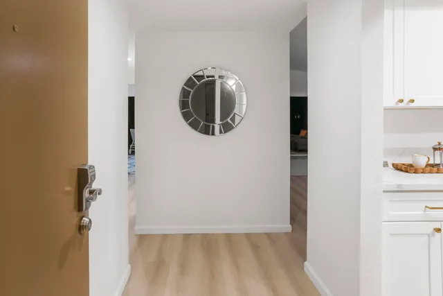 a picture of a bathroom with a sink and a mirror