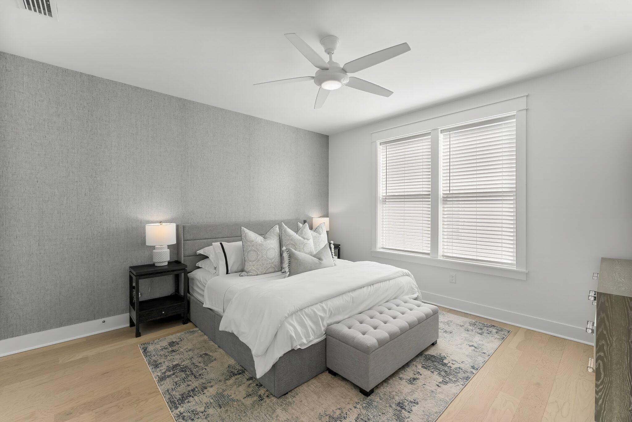 15 Beach View Drive Inlet Beach, FL 32461 - Photo 11 of 46 a bedroom with a large bed mirror and a window