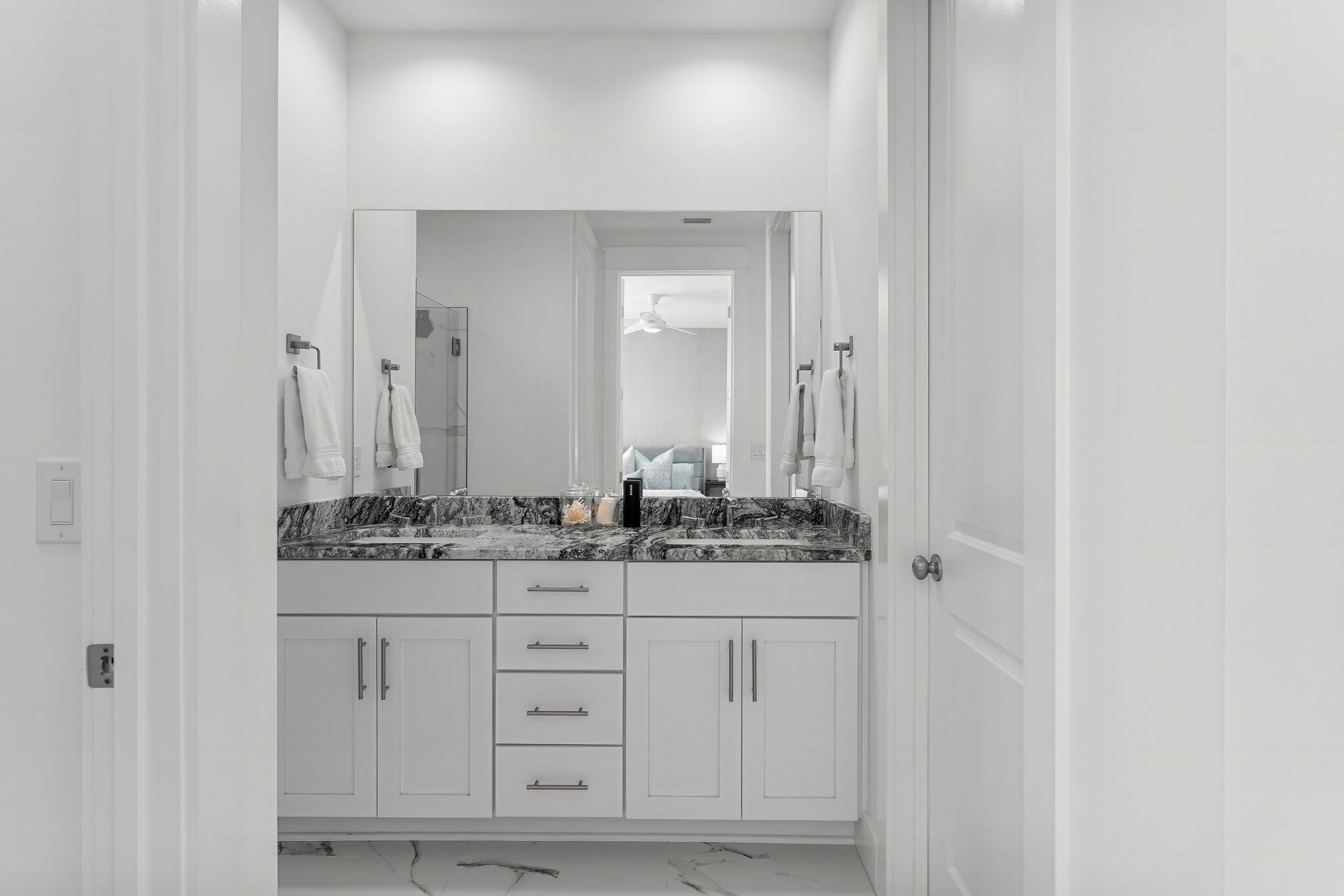 15 Beach View Drive Inlet Beach, FL 32461 - Photo 12 of 46 a bathroom with a sink and a mirror