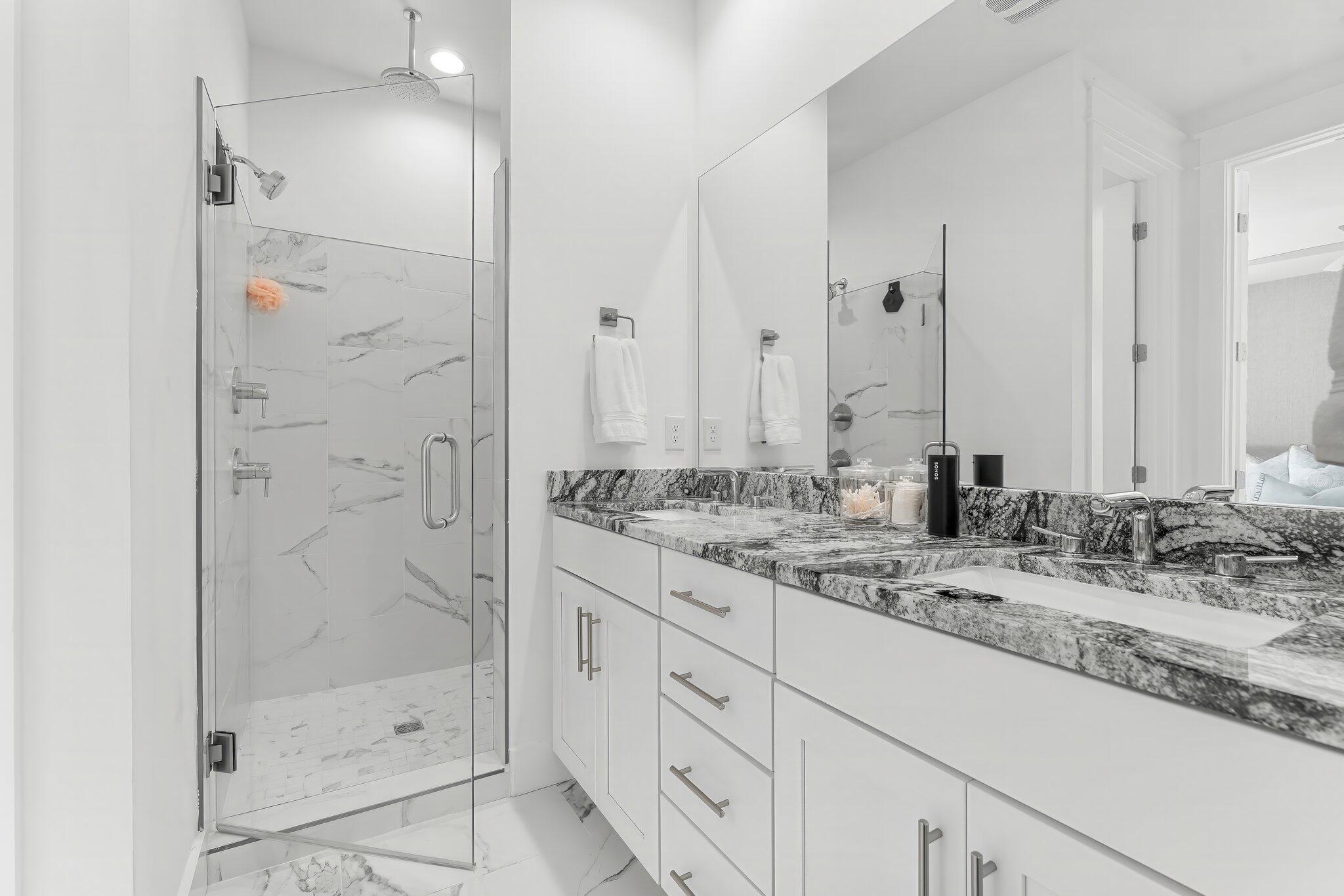 15 Beach View Drive Inlet Beach, FL 32461 - Photo 13 of 46 a bathroom with a granite countertop sink two mirror and shower