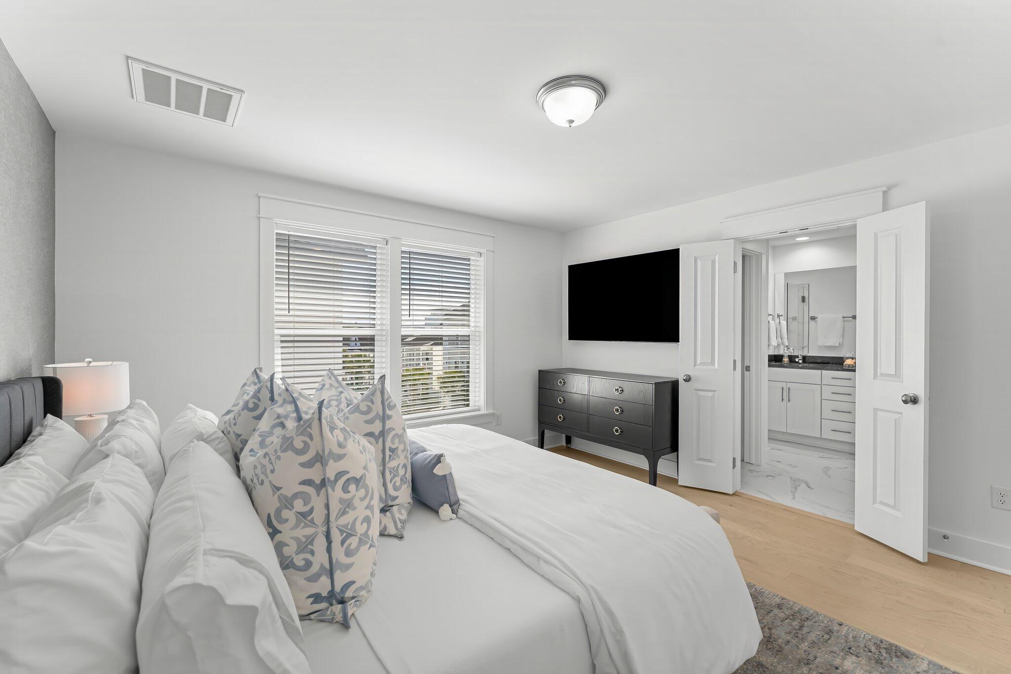15 Beach View Drive Inlet Beach, FL 32461 - Photo 22 of 46 a bedroom with a bed and a flat screen tv