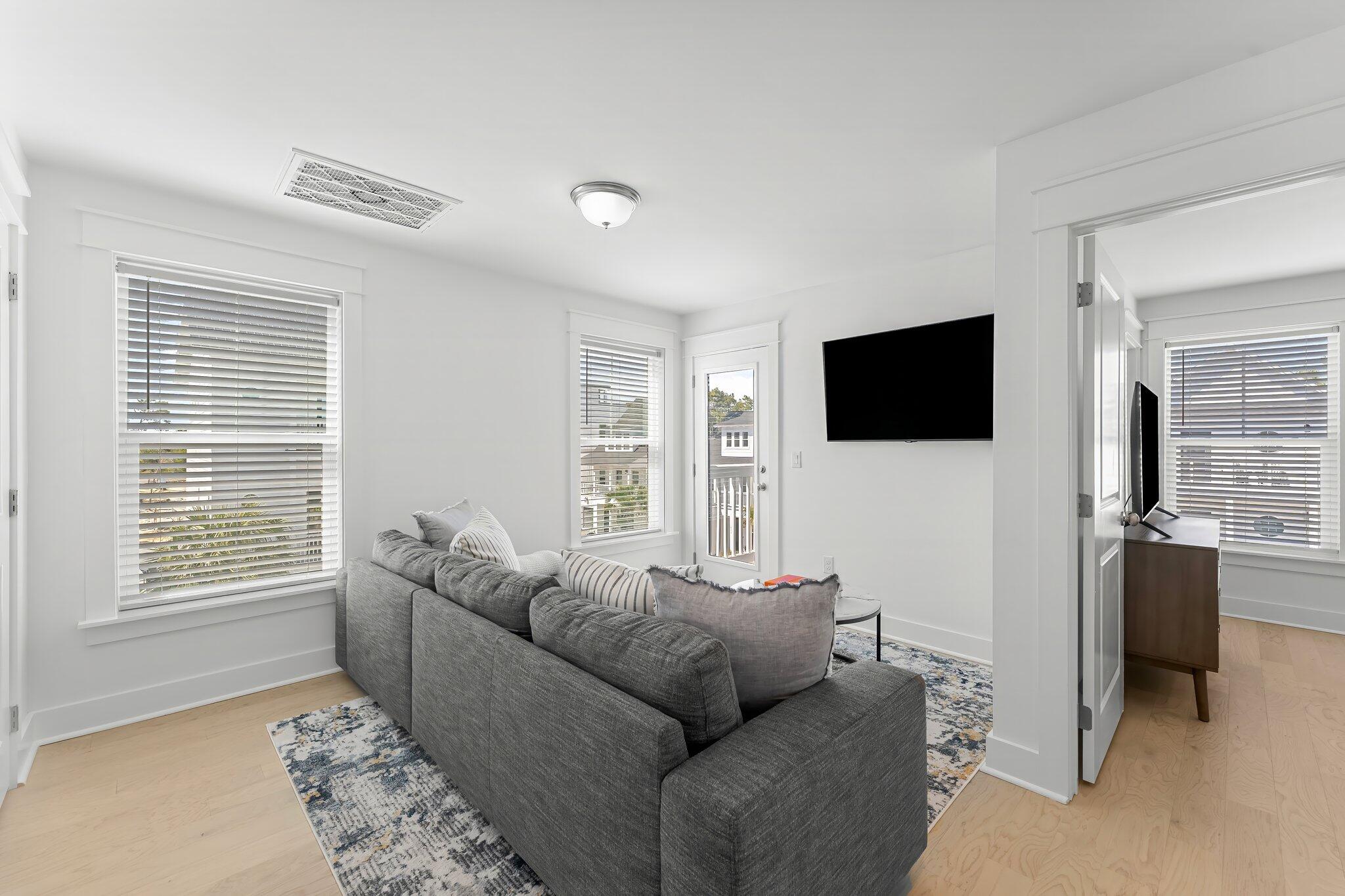 15 Beach View Drive Inlet Beach, FL 32461 - Photo 27 of 46 a living room with furniture and a flat screen tv