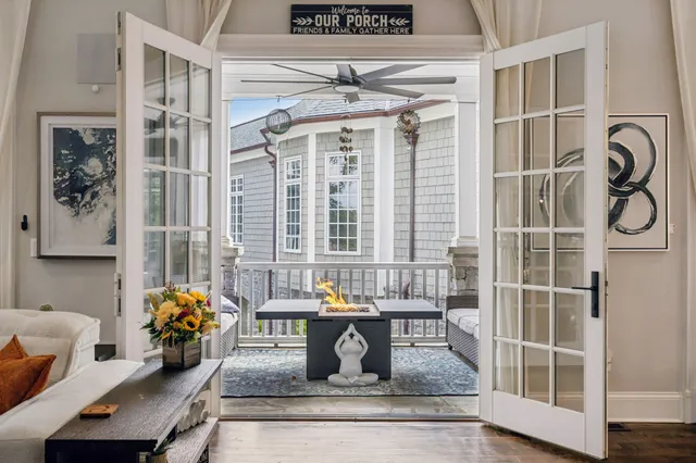 a bathroom with a sink mirror and a bathtub