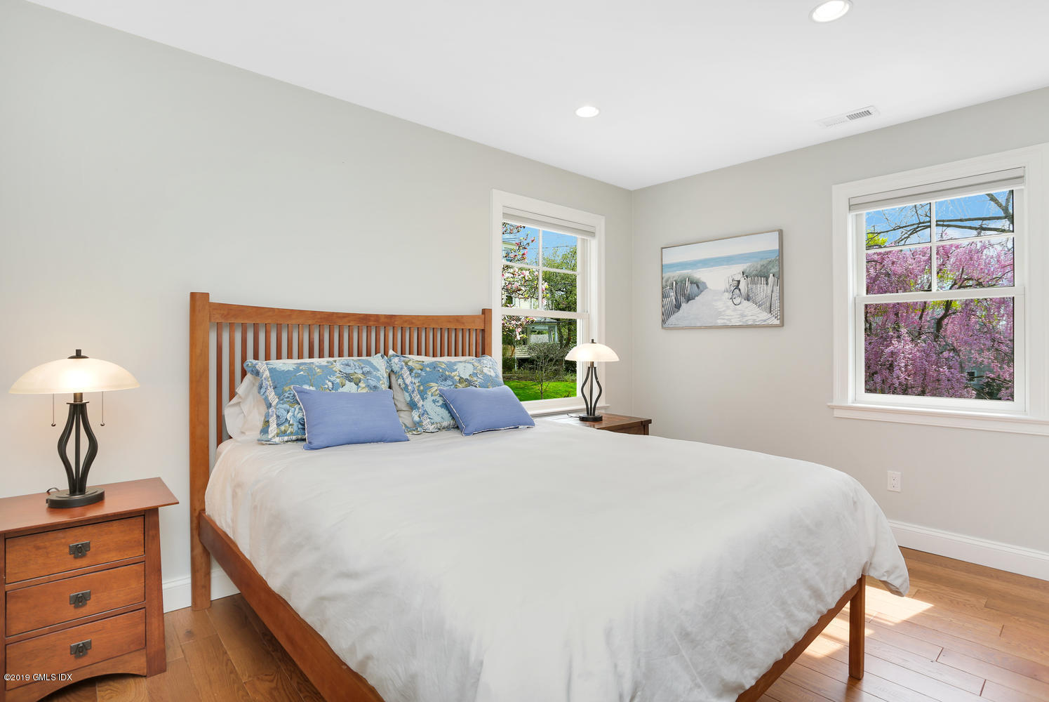 35 Chapel Lane Riverside, CT 06878 - Photo 19 of 45 a bedroom with a large bed and a window