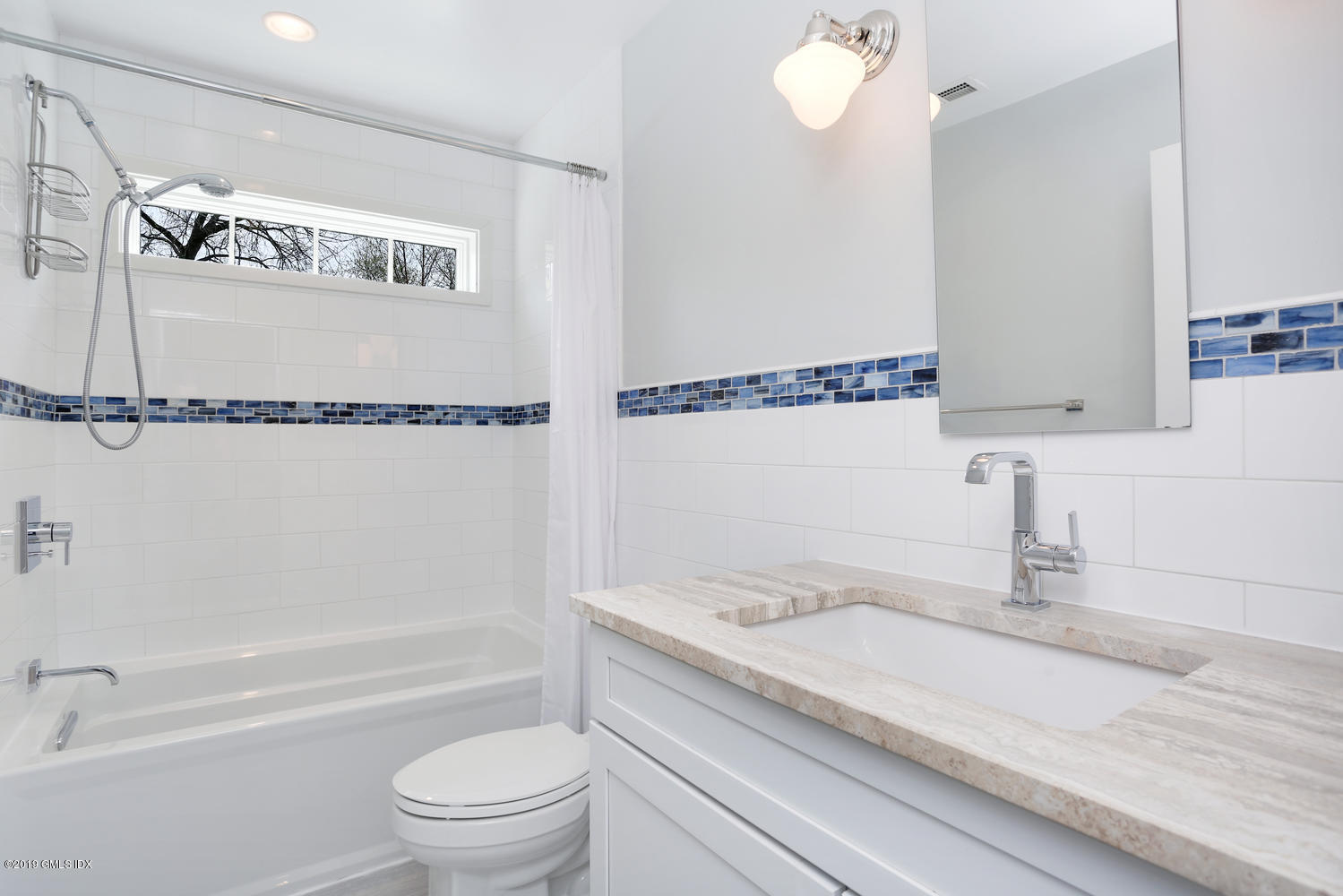 35 Chapel Lane Riverside, CT 06878 - Photo 20 of 45 a bathroom with a granite countertop sink a toilet and shower