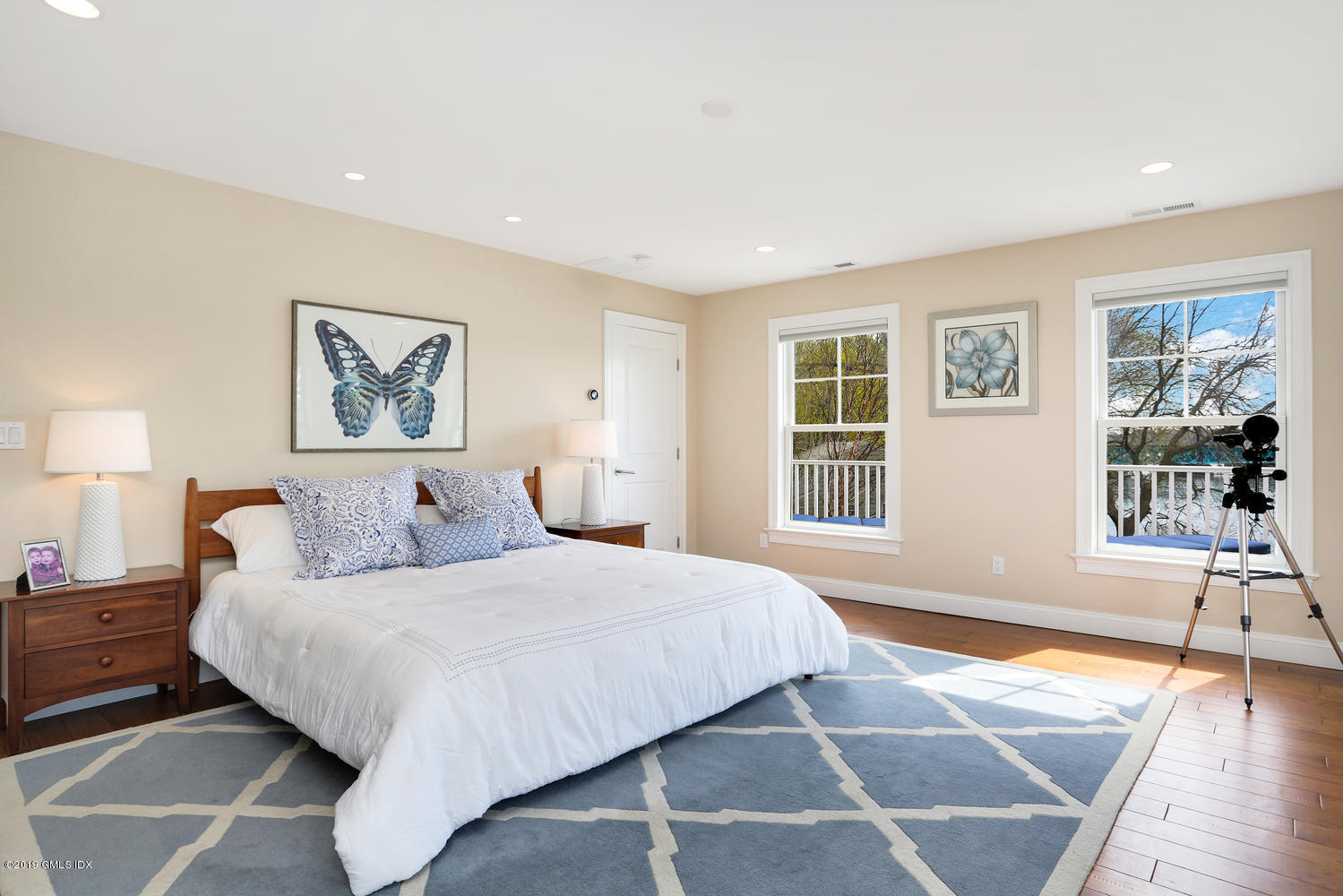 35 Chapel Lane Riverside, CT 06878 - Photo 23 of 45 a bedroom with a large bed and a window