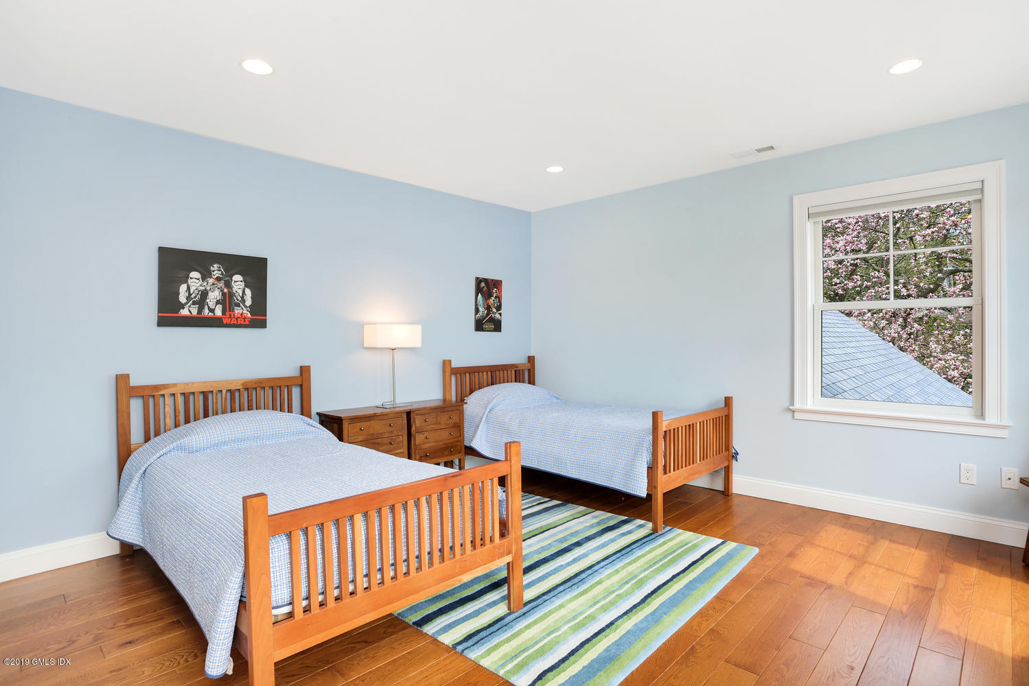 35 Chapel Lane Riverside, CT 06878 - Photo 27 of 45 a bedroom with furniture and a rug