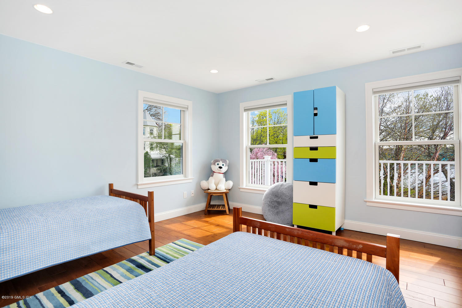 35 Chapel Lane Riverside, CT 06878 - Photo 28 of 45 a bed room with furniture and a window