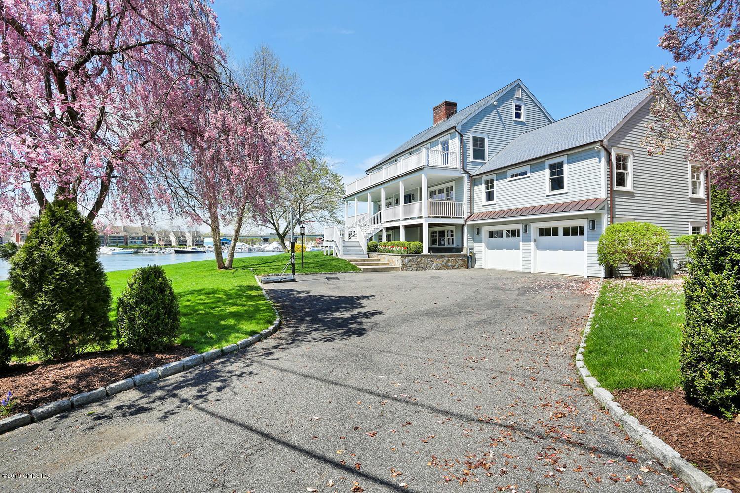35 Chapel Lane Riverside, CT 06878 - Photo 40 of 45 front view of a building with a yard