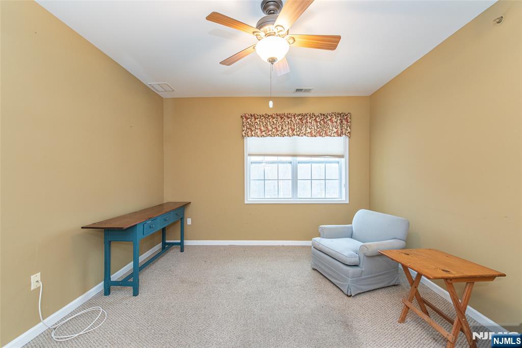 10323 Warrens Way Wanaque, NJ 07465 - Photo 19 of 30 a living room with furniture and a window