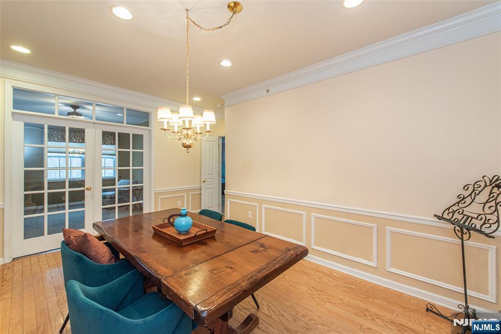 10323 Warrens Way Wanaque, NJ 07465 - Photo 7 of 30 a view of a dining room with furniture window and wooden floor