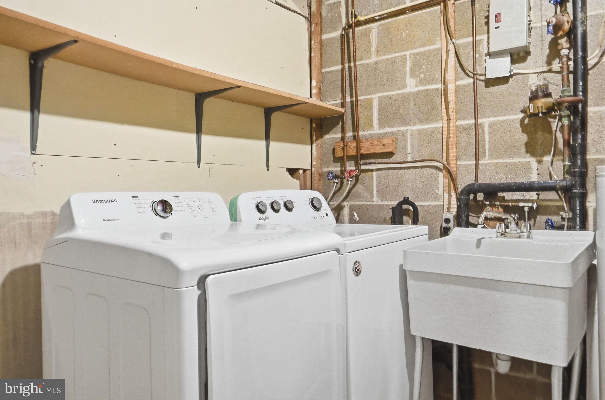 6470 Franconia Court Springfield, VA 22150 - Photo 28 of 31 a utility room with dryer and washer
