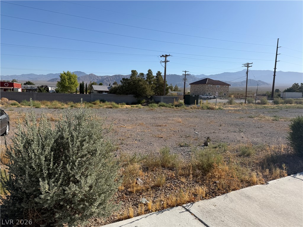 6041 Hafen Ranch Road Pahrump, NV 89061 - Photo 4 of 12 A spacious, buildable lot offers vast mountain views and clear blue skies.