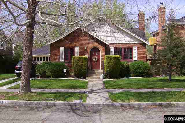 665 Manor Drive Reno, NV 89509 - Photo 1 of 9 a front view of a house with garden