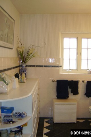 665 Manor Drive Reno, NV 89509 - Photo 2 of 9 a bathroom with a sink and a bathtub
