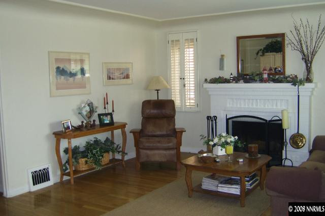 665 Manor Drive Reno, NV 89509 - Photo 8 of 9 a living room with furniture and a fireplace