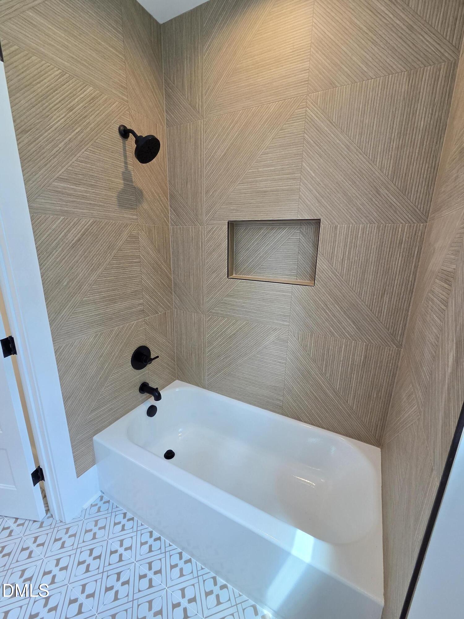 712 Van Buren Road Raleigh, NC 27604 - Photo 26 of 34 a bathroom with a bathtub