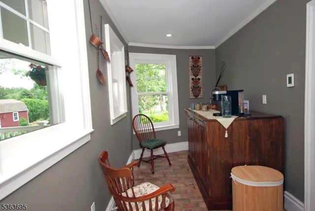 a bathroom with a sink a vanity and a mirror