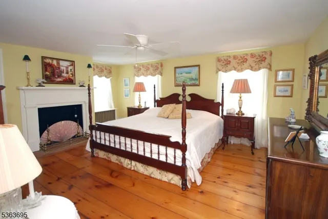 a bed room with a bed and a chandelier