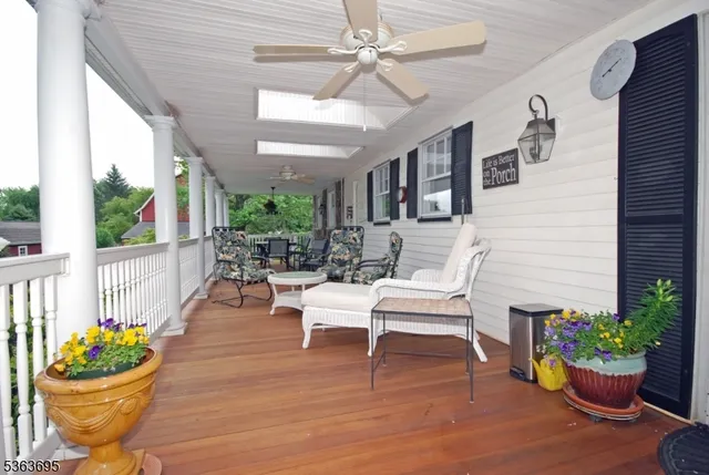 a view of a house with a yard and plants