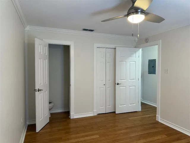 a view of a livingroom with wooden floor
