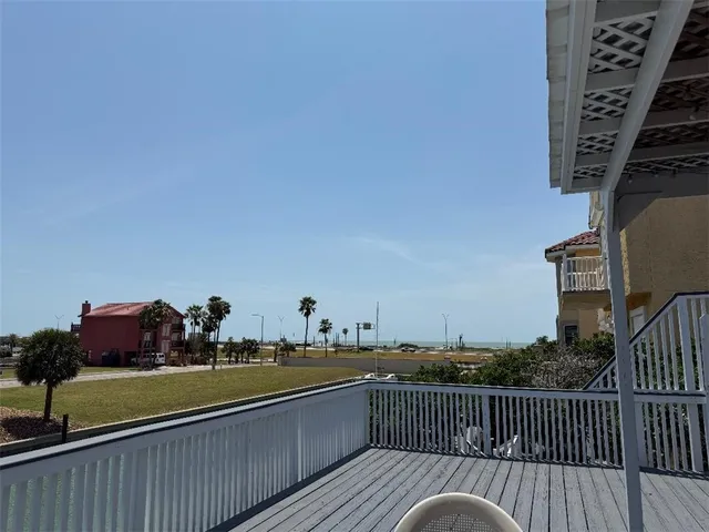 a view of balcony and wooden deck