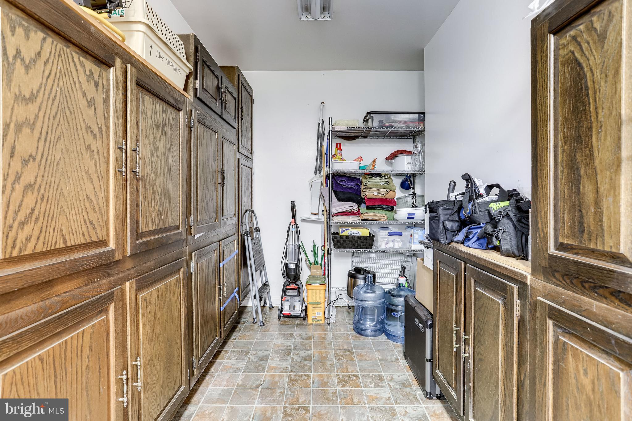 6905 Conservation Drive Springfield, VA 22153 - Photo 34 of 41 Built in storage cabinets