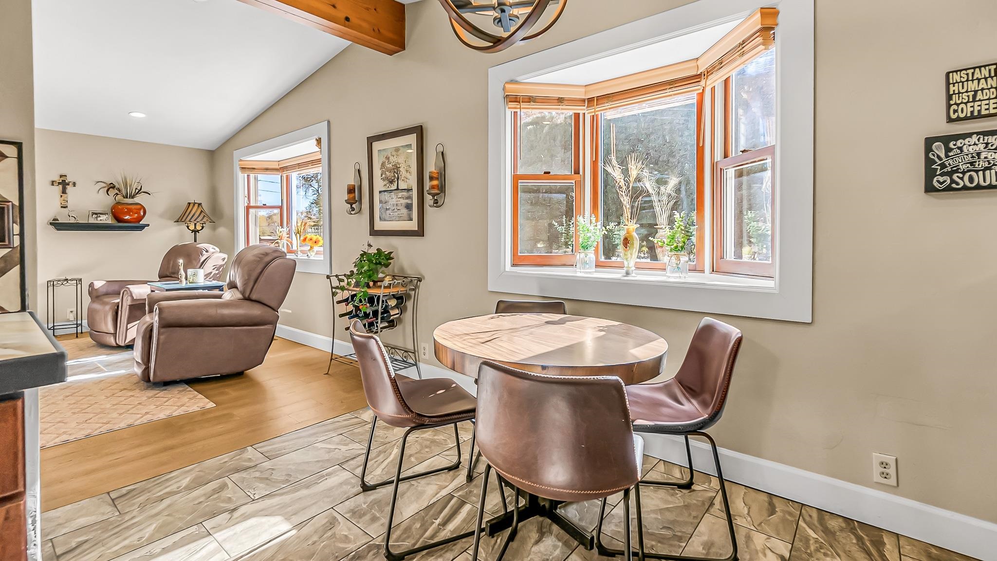 623 26 Road Grand Junction, CO 81505 - Photo 15 of 42 a view of a dining room with furniture window and wooden floor